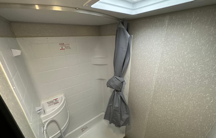 Shower and bathroom sink when its time to clean up.