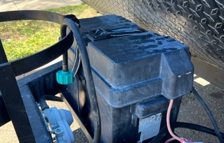 Battery housing in front of trailer