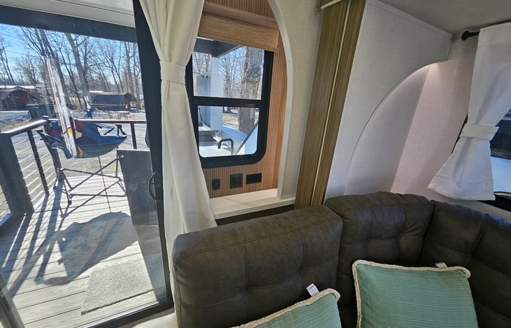 Window between couch and patio