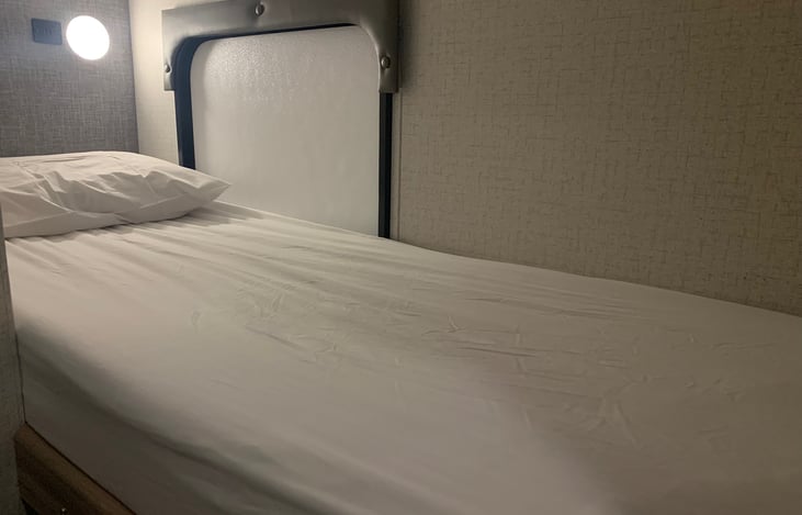 Bottom bunk.  Bunk folds up for extra storage during travel.