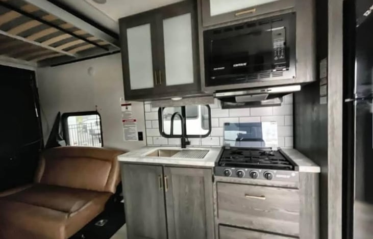 Microwave serves as oven and air fryer, gas stove.