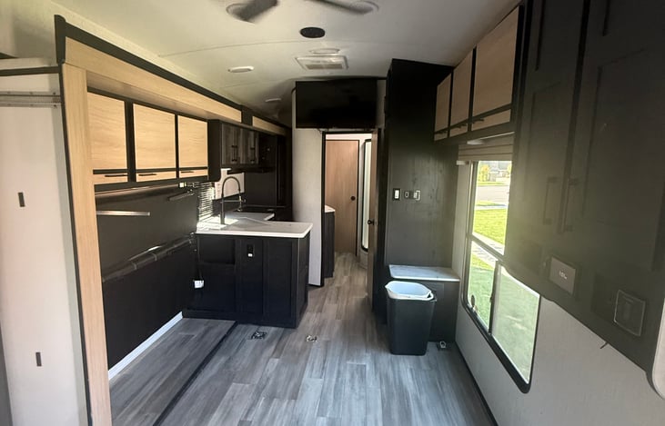 Picture with the slide in. When slide is extended you can get to the main cabin thru the kitchen