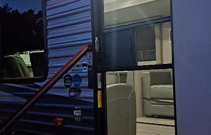 Exterior lighting available in multi colors.  Screen door.