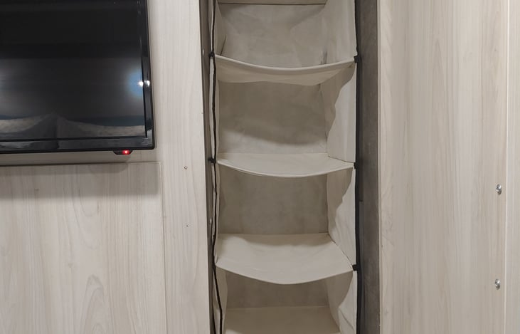 More closet. Removable shoe compartment can then be used to hang coats.