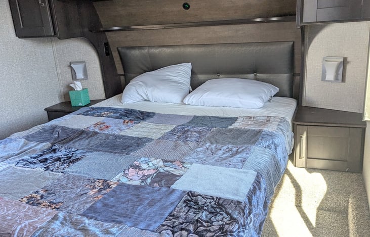 Spacious bedroom with Queen bed.