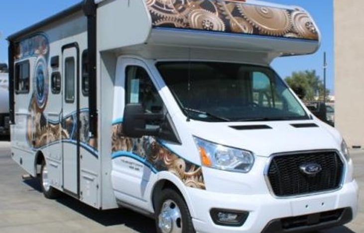 Passenger side, entry door with awning.