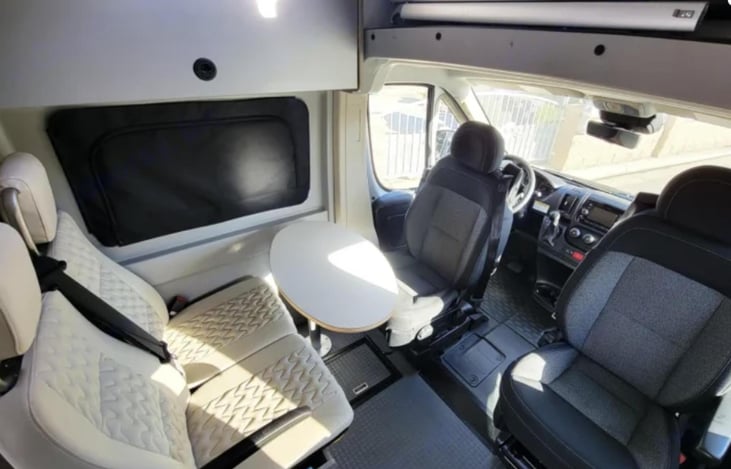 Both front seats swivel around to create a dining area