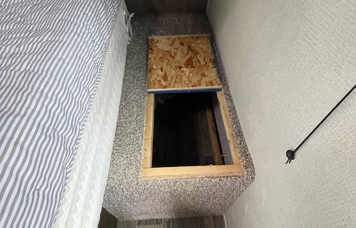 Access to storage under trailer.