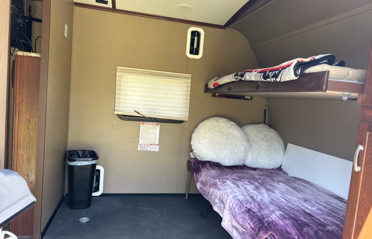 Beds go up for the toy hauler, you can fit a couple bikes, or kayaks, or keep them down for an extra private room!