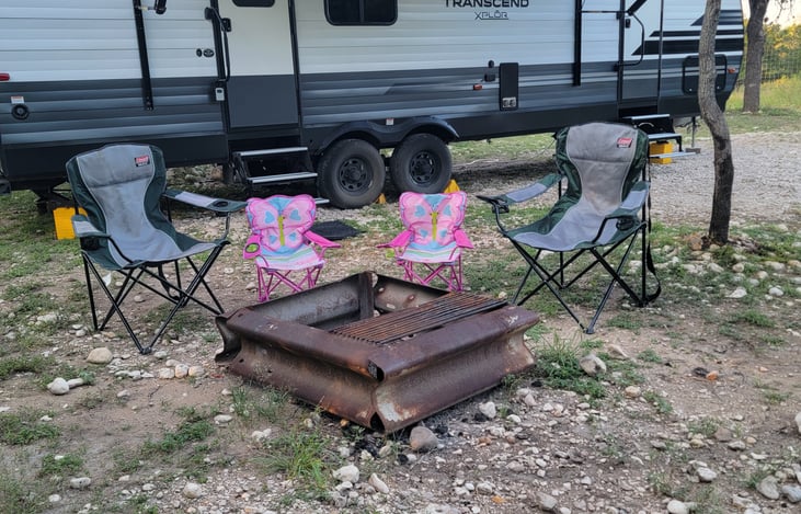 Front outside by doors with awning