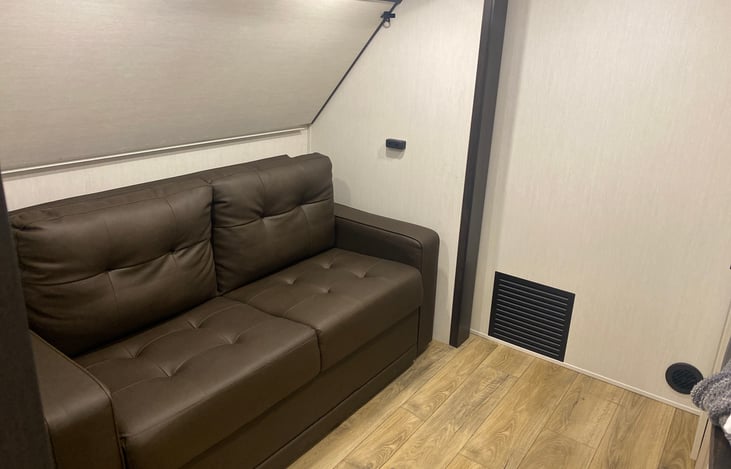 Jackknife sofa in bunkroom