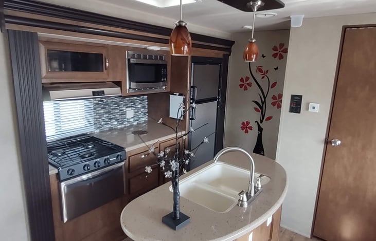 Kitchen including island