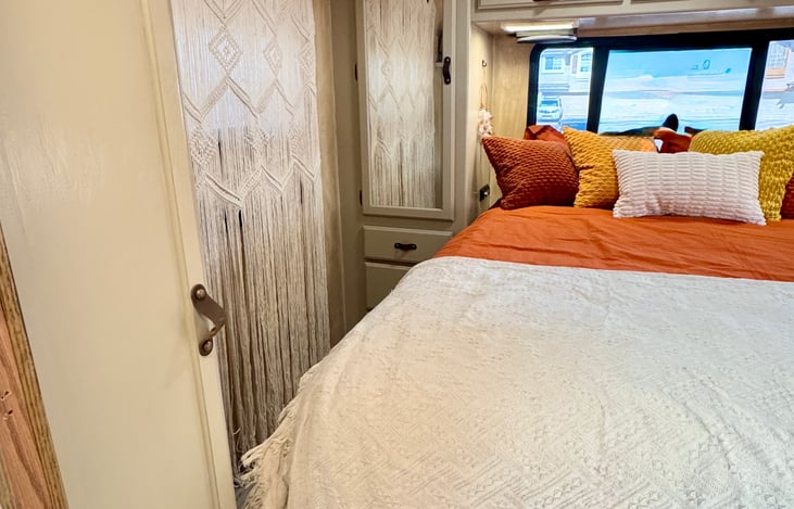 Primary Bedroom in the back of the RV - left side