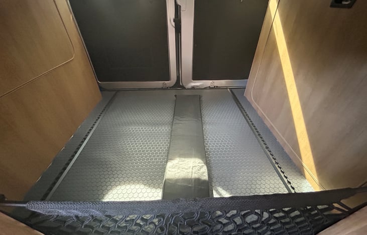 Back of van, under the bed storage. VERY roomy!