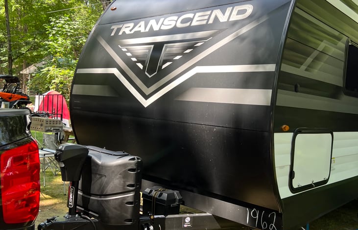 Propane tanks 2- 20 lb under cover with top access door to controls for propane