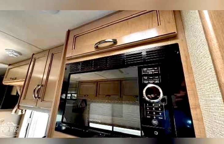 Kitchen equipped with all the essentials including coffee maker and toaster