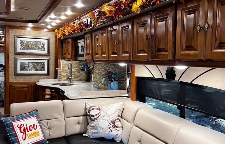 Includes a sectional sleeper, providing versatile sleeping arrangements for guests. This feature combines comfort and functionality, offering a cozy space to relax during the day and a comfortable bed