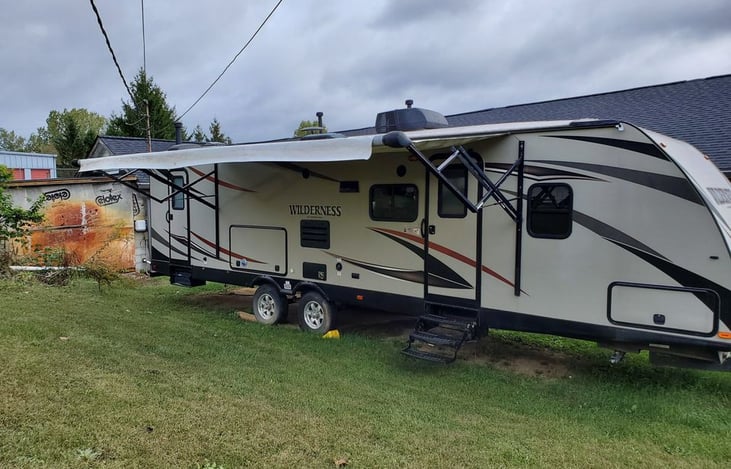 Outdoor kitchen in addition to full kitchen inside.
