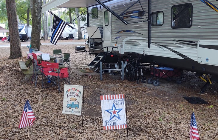 Outdoor chairs provided, along with tarp matting, and fan (if needed).
