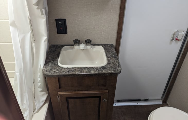 Bathroom sink with hot and cold water.