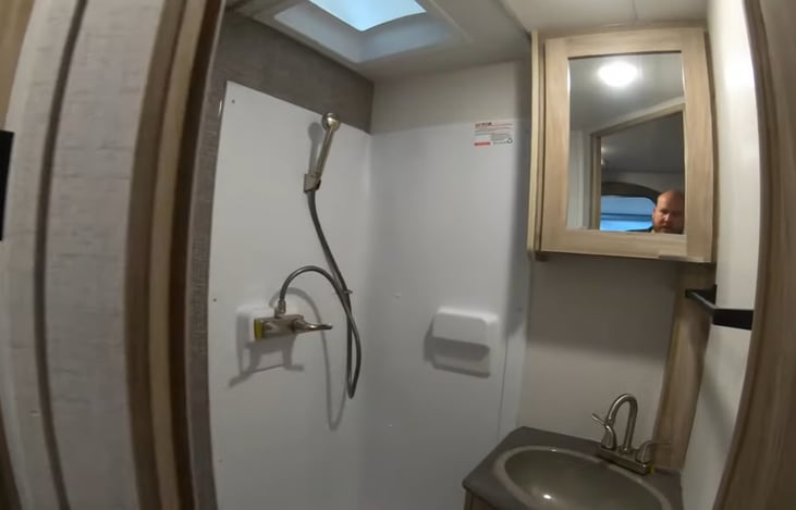 Floor, dry bathroom. Sink, medicine cabinet, and under sink storage