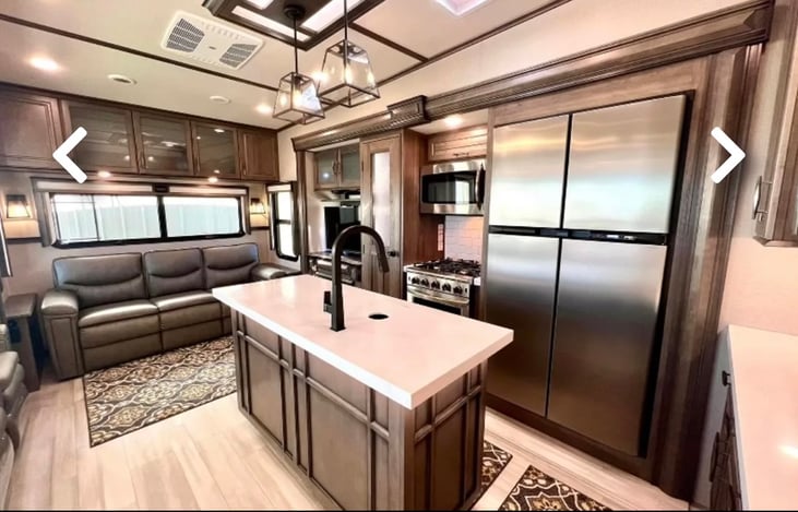 We LOVE the huge fridge in this RV. Plenty of space to hold your cold groceries.
