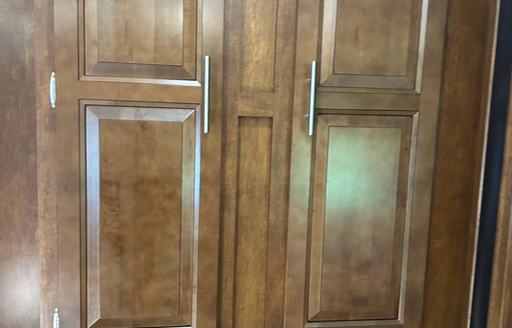 Storage area for appliances and plastic or silver wear.