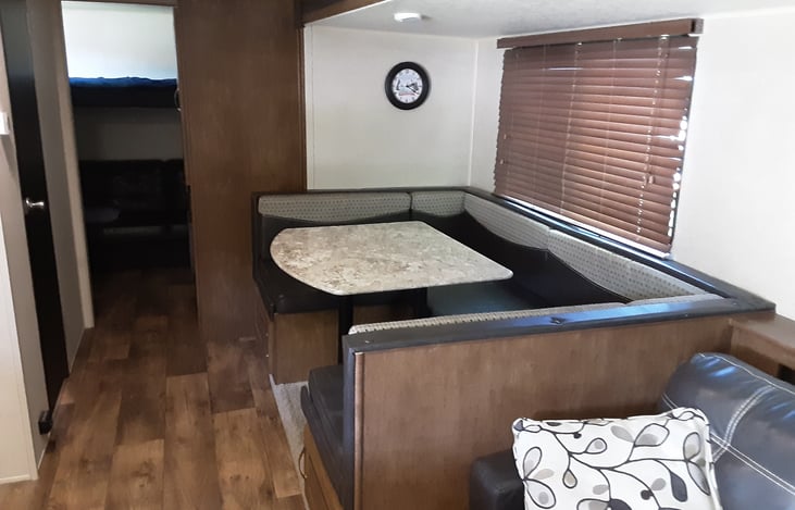 Dinning table, also folds into a bed for 2 adults