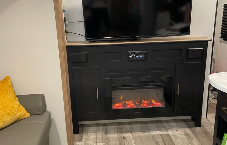 An indoor fireplace that provides ambience and heat on chilly night. There’s also a central heating system as well.