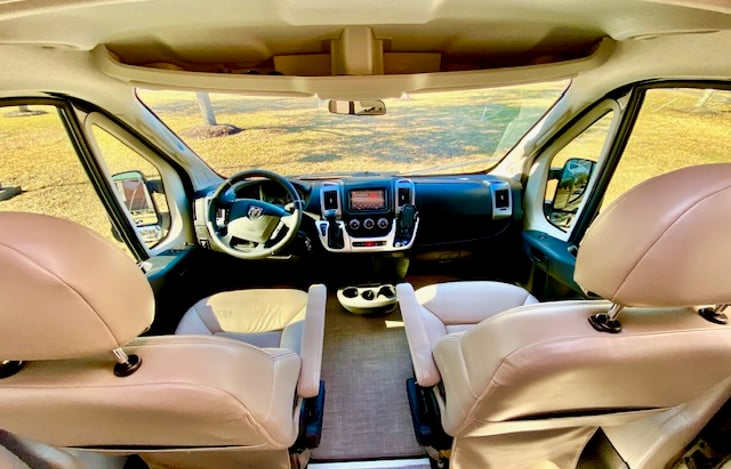 Cushy but supportive captains chairs are your friend for your long road trips.  Front and side windows are tinted to help keep you comfortable.