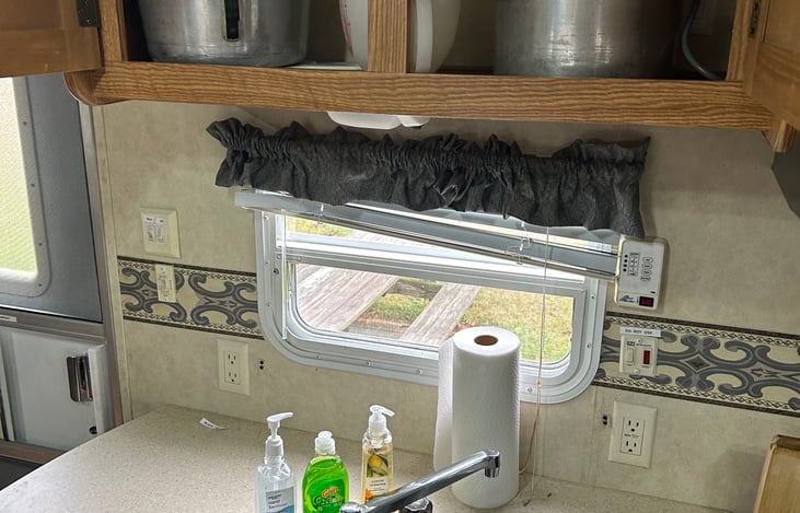 We supply hand soap sanitizer and scrubby and one roll of paper towel