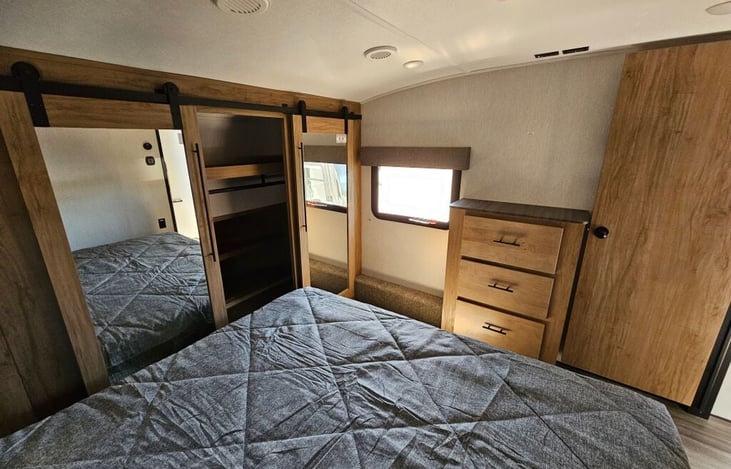 Master Bedroom. Includes king-size bed, closet storage with hanging rod, clothes washer and dryer