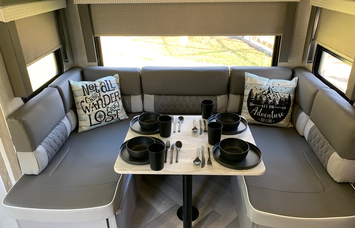 Dinette converts to a queen size bed. Linens and pillows included.