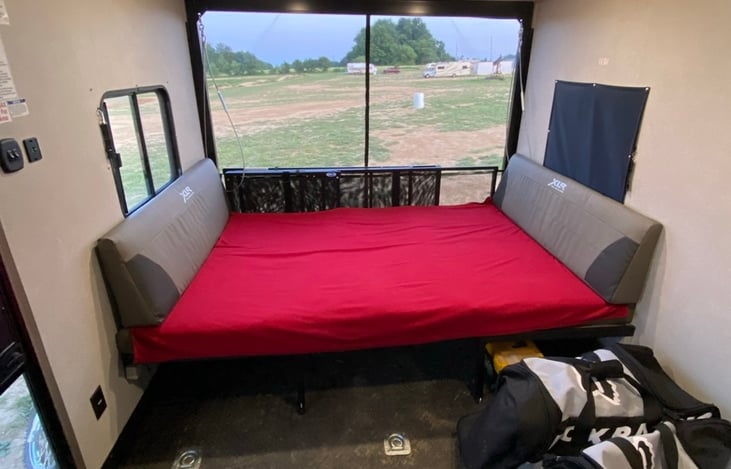 This is the drop down bed in the back - it folds up onto the wall like a Murphy bed