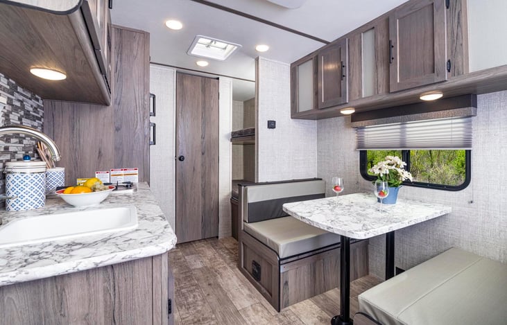 Twin Bunks in the far corner with a door to the bathroom
