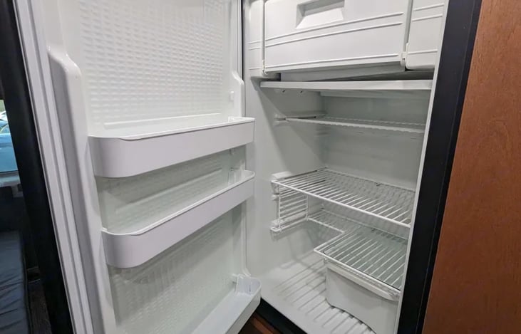 Large (for a van) Fridge and freezer. We can fit food for a week easily