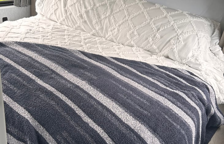 The king beg has a reclining button so you can position it up higher to sit up for reading a book or allow more space to walk around