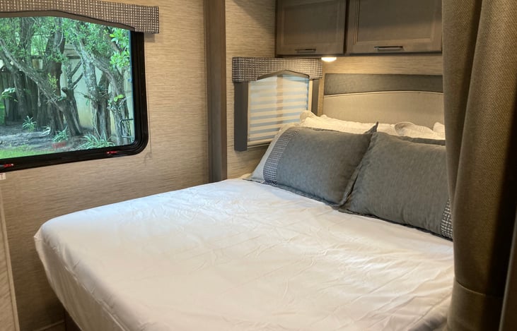 Super comfy Queen bed with white linens