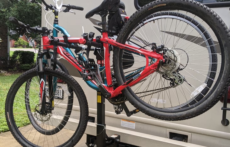 Carries two adult bikes and one children's bike. Any more than this and you may want to bring the available trailer.