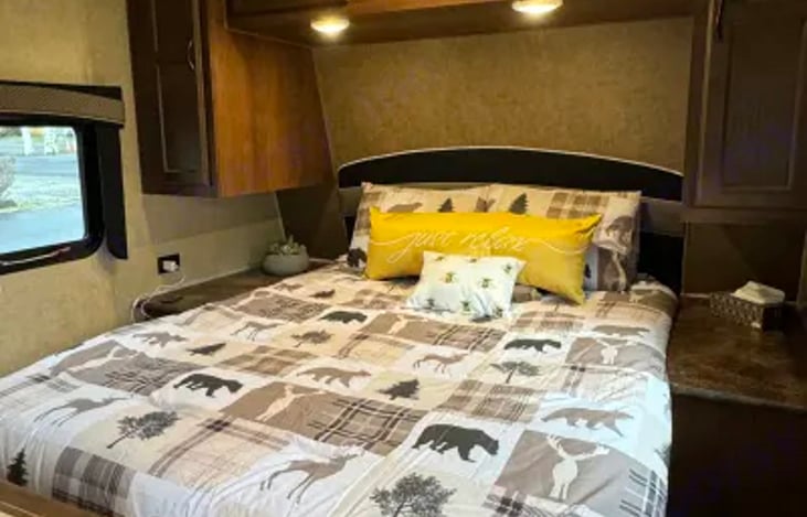 Queen walk-a -round bed with pillow topper.