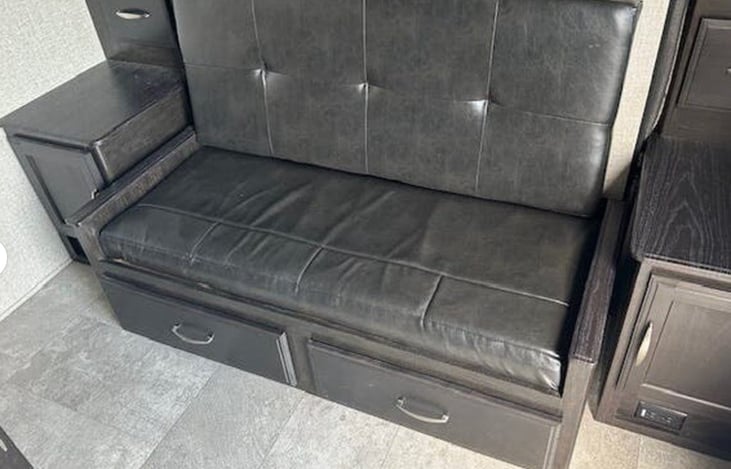 Murphy Bed Close-Up: Murphy bed in day mode—extra seating in the day & bed at night.