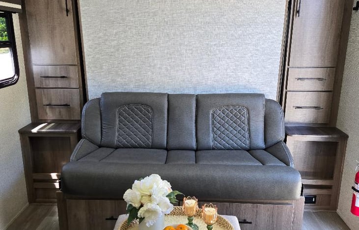 murphy bed closed, couch setup