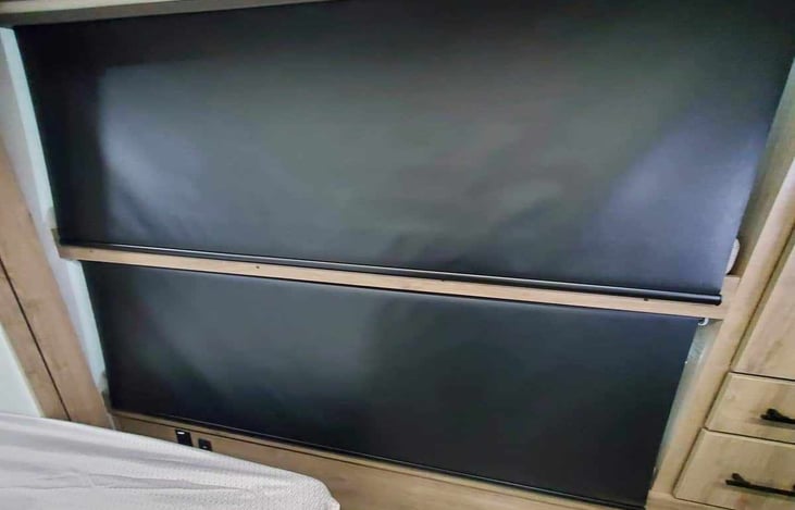 Privacy curtains that pull down on bunks. 
Small usb chargeable fans are included to help with airflow when curtains are pulled down.