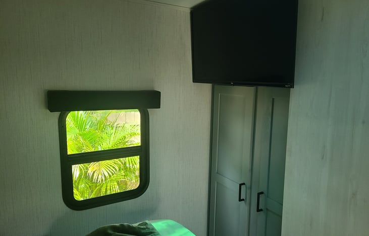 32" mounted TV in bedroom.  Yes there is Wifi :)