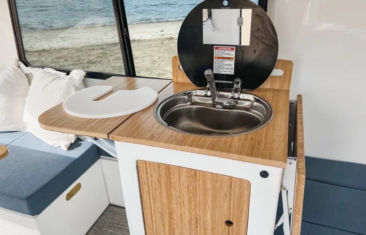 Sink with Drop Leaf Prep Area & Fridge on Bottom