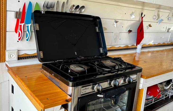 Towards the back of the van, this is the stove and oven. You are given two propane tanks to start your journey.