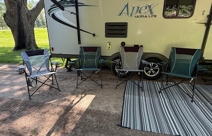 Four Kijaro camp chairs.