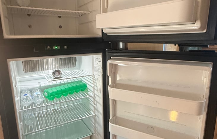 Spacious RV fridge—keeps your food fresh and drinks cold wherever you roam ❄️🚐