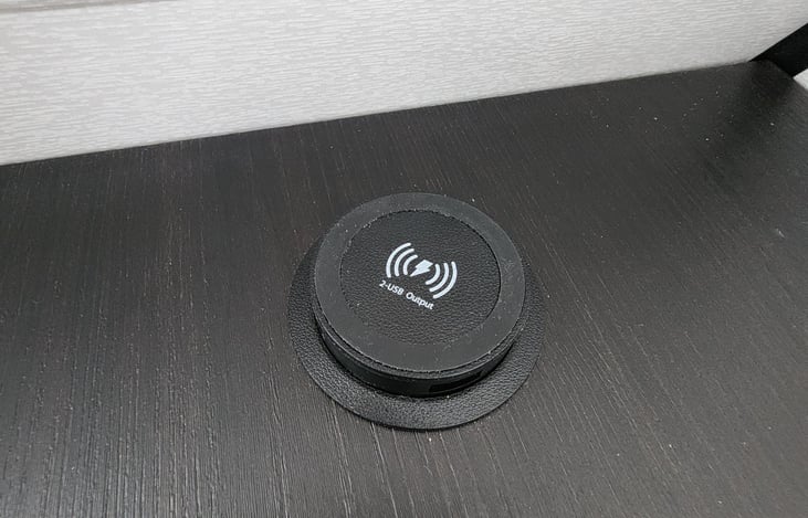 WIreless charger at each night stand with pop up usb charger