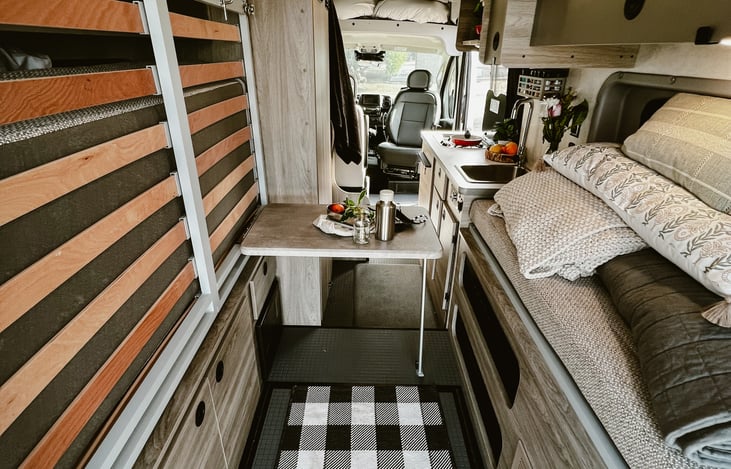 Rear to front view of Murphy bed stored and table set up